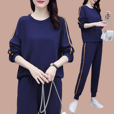 Sieviešu treniņtērps ar apmalīti un kabatu