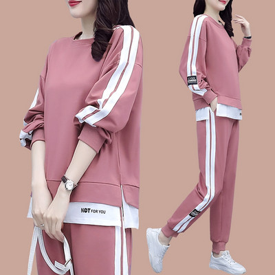 Sieviešu treniņtērps ar apmalīti un kabatu