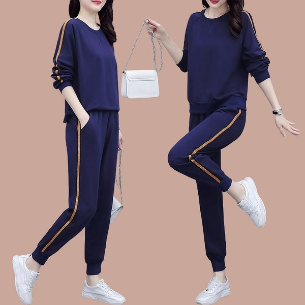 Sieviešu treniņtērps ar apmalīti un kabatu