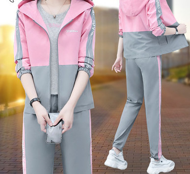 Női csapat cipzárral és kapucnival