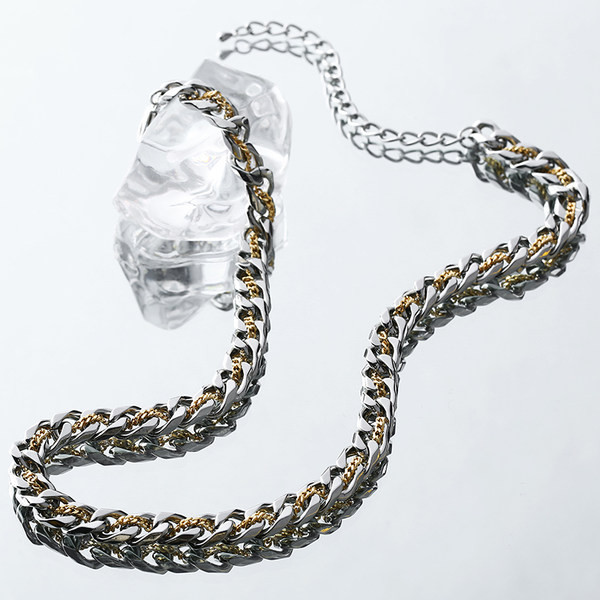 Divslāņu titāna tērauda ķēde