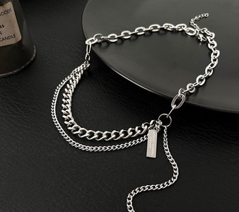 Divslāņu titāna tērauda vīriešu ķēde