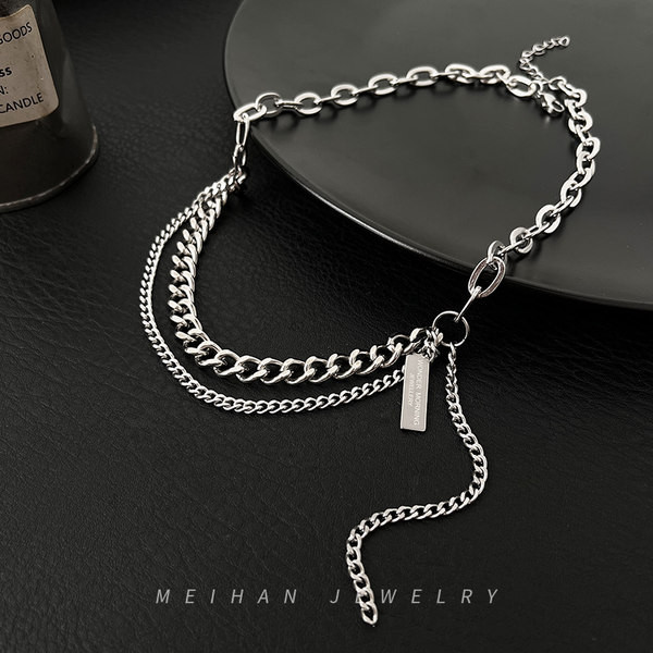 Divslāņu titāna tērauda vīriešu ķēde