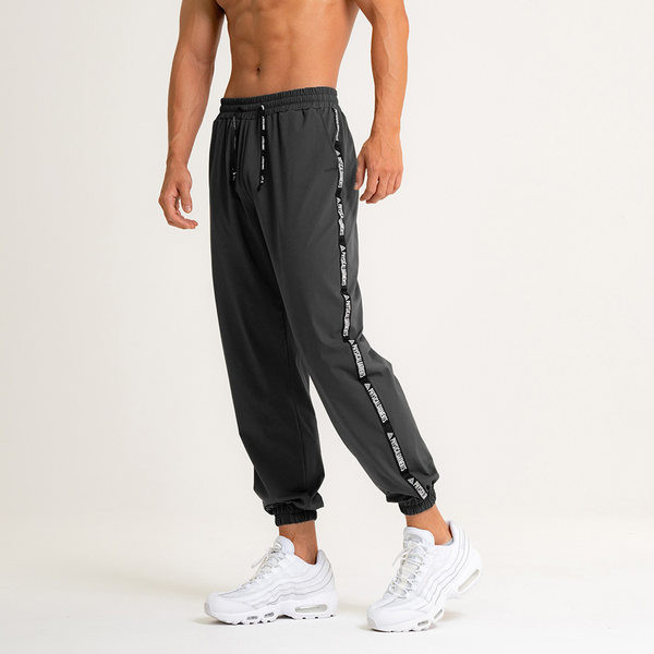 Ātri žūstošas vīriešu treniņbikses ar kaklasaiti un kabatu