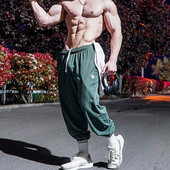 Plaša modeļa vīriešu bikses ar šņorēm un kabatu