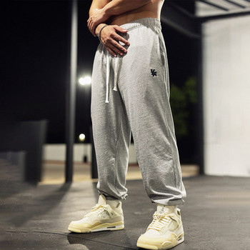 Широк модел мъжки панталон с връзки и джоб