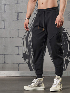 Széles modell sportnadrág zsebbel