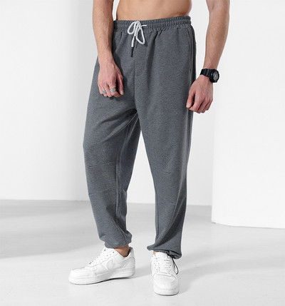 Tiszta melegítőnadrág zsebbel és fűzővel