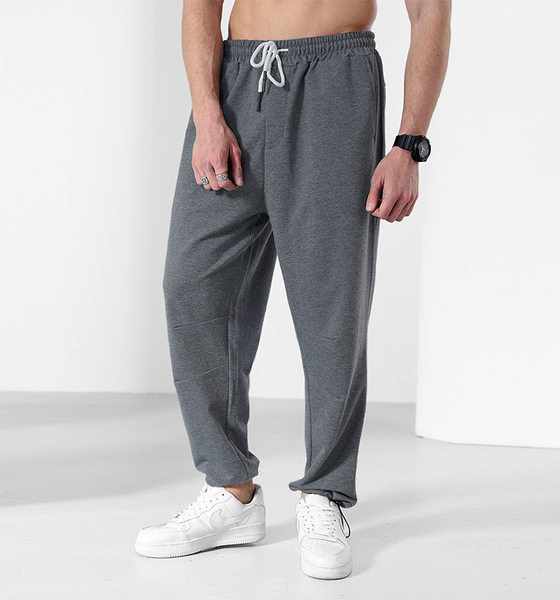 Tiszta melegítőnadrág zsebbel és fűzővel