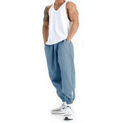 Férfi nadrág gumival és zsebbel