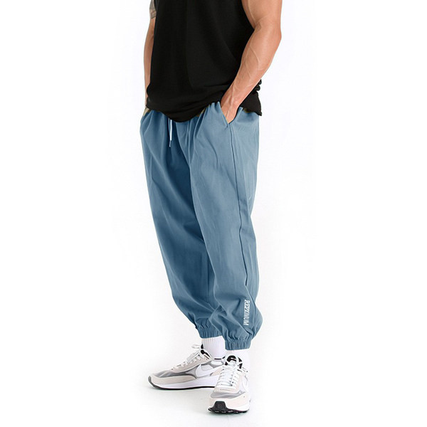 Férfi nadrág gumival és zsebbel