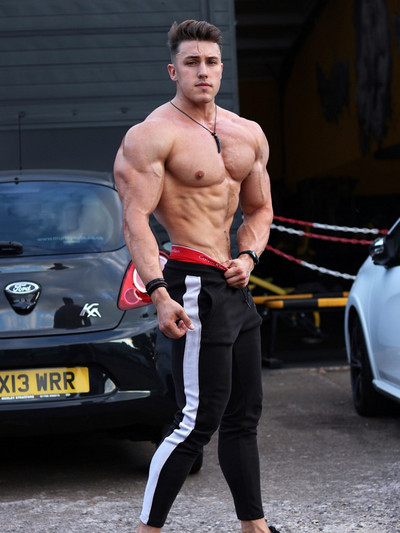 Pieguļošas vīriešu sporta bikses ar skavām un uzrakstiem