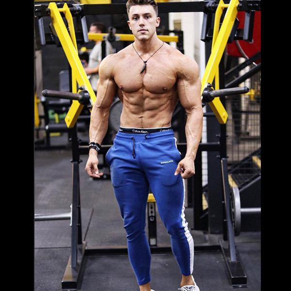 Pieguļošas vīriešu sporta bikses ar skavām un uzrakstiem