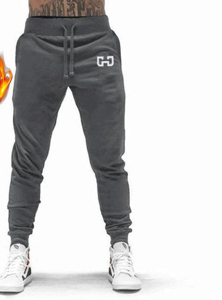 Vīriešu treniņbikses ar kabatu, saitēm un oderi