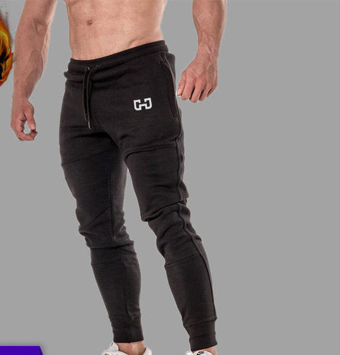 Vīriešu treniņbikses ar kabatu, saitēm un oderi