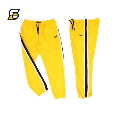 Alkalmi férfi nadrág csíkozással és felirattal