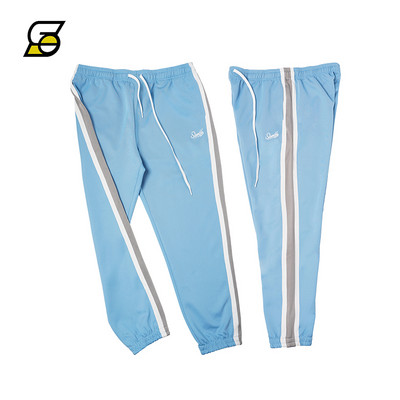 Alkalmi férfi nadrág csíkozással és felirattal