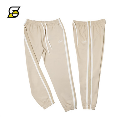 Alkalmi férfi nadrág csíkozással és felirattal