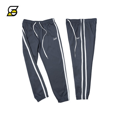 Alkalmi férfi nadrág csíkozással és felirattal