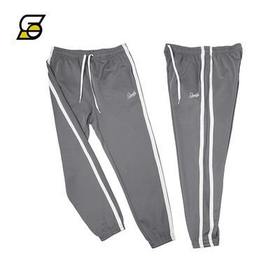 Alkalmi férfi nadrág csíkozással és felirattal