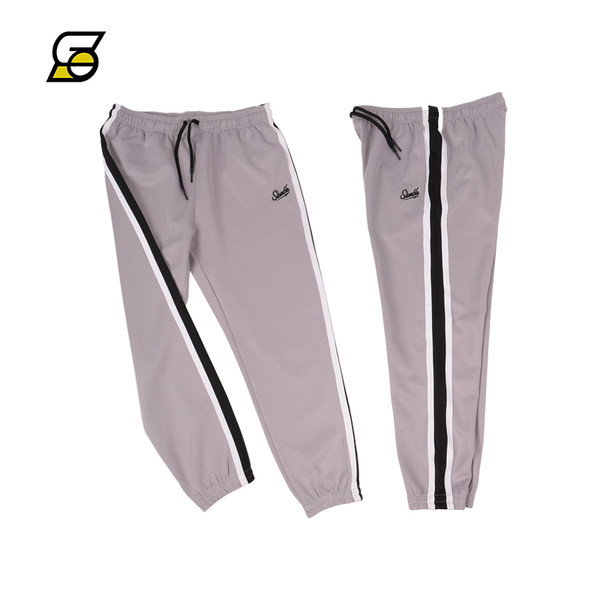 Alkalmi férfi nadrág csíkozással és felirattal