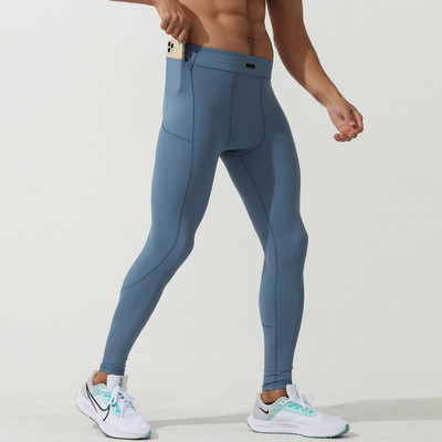 Vīriešu elastīgie legingi ar kabatu
