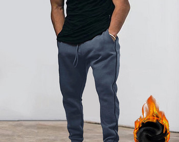 Ватиран мъжки спортен панталон с връзки и джоб