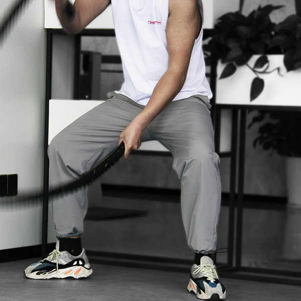 Vīriešu sporta bikses ar šņorēm un kabatu