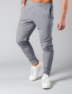 Tīras bikses ar šņorēm un kabatu