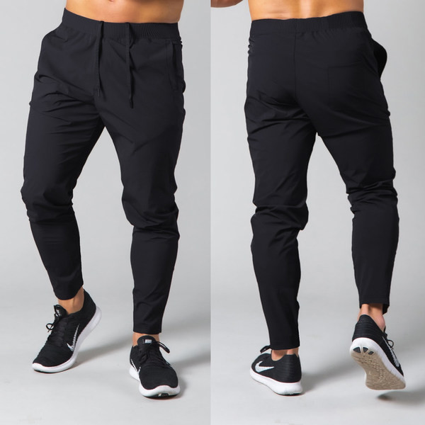 Tīras bikses ar šņorēm un kabatu