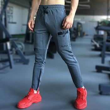 Модерен мъжки спортен панталон с цип и връзки