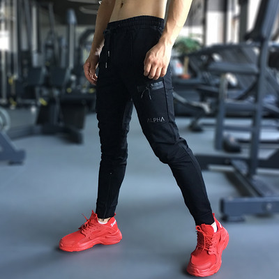 Madingos vyriškos sportinės kelnės su užtrauktuku ir raišteliais
