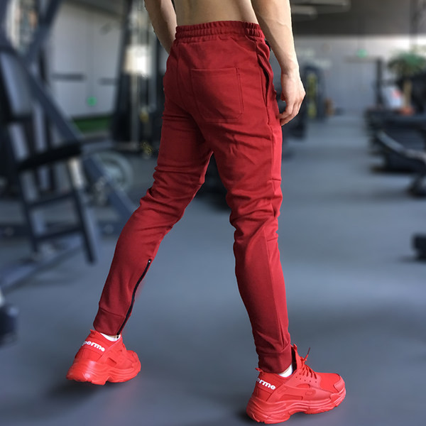 Modes vīriešu treniņbikses ar rāvējslēdzēju un mežģīnēm