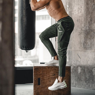 Vīriešu sporta bikses ar apdruku un šņorēm