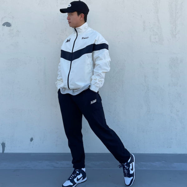 Elastīgas vīriešu bikses ar kabatu un saitēm