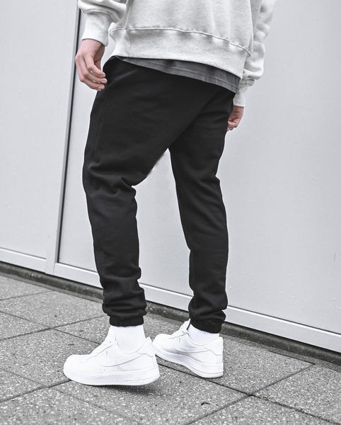 Plaša modeļa vīriešu bikses ar kabatu, šņorēm un uzrakstu