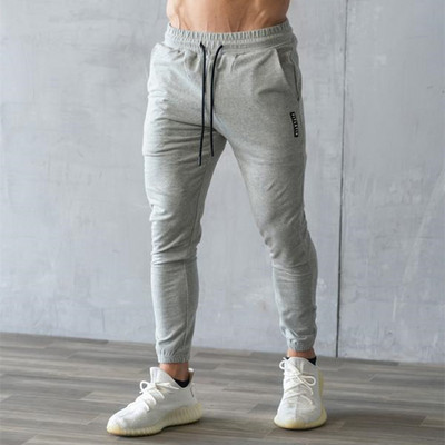 Vīriešu sporta bikses ar mežģīnēm