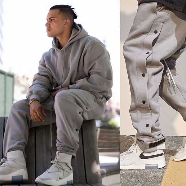 Ležerne trenirke s bočnim gumbima i vezicama