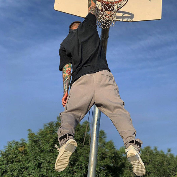 Ležerne trenirke s bočnim gumbima i vezicama