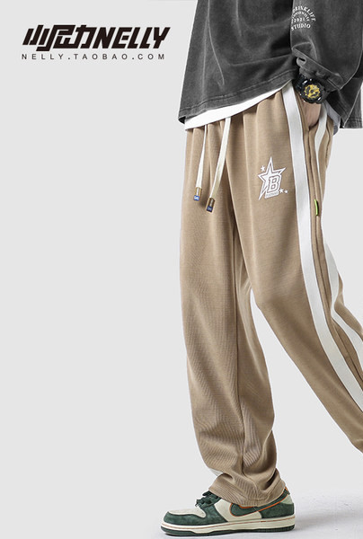 Férfi nadrág széles modell zsebbel és fűzővel