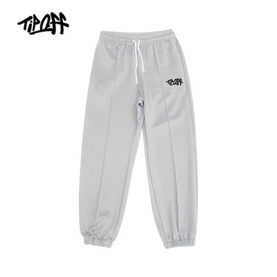 Sporta bikses ar gumiju kājās un uzrakstu vīriešiem