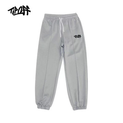 Sporta bikses ar gumiju kājās un uzrakstu vīriešiem