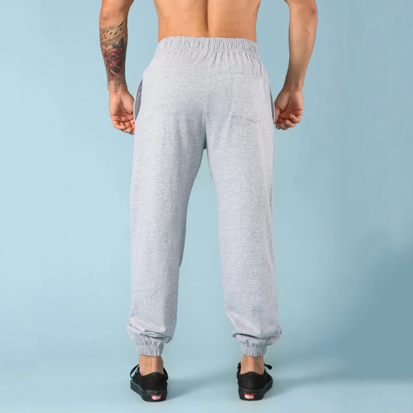 Ανδρικό αθλητικό παντελόνι με κέντημα και λάστιχο στα μπατζάκια