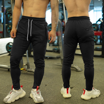 Мъжки спортен панталон с джоб и връзки