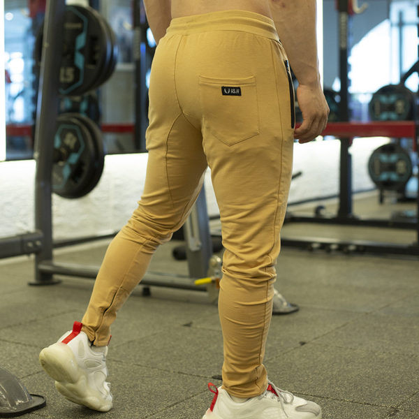 Férfi sportnadrág zsebbel és fűzővel