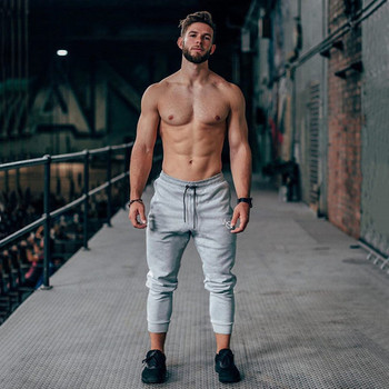Мъжки едноцветни панталони спортен модел с джоб