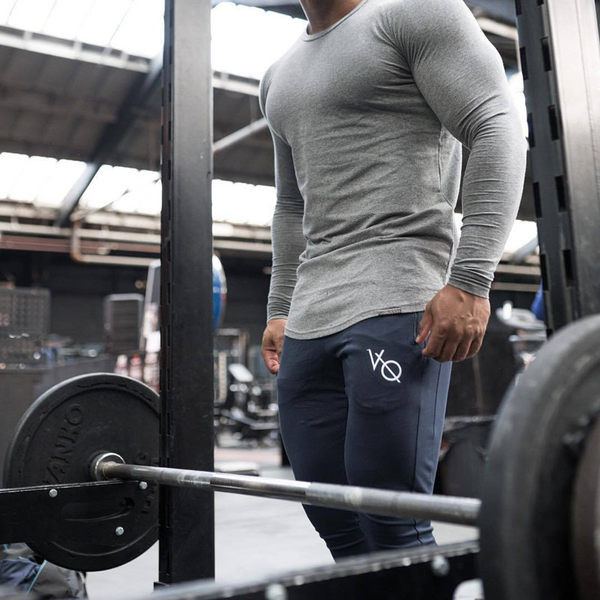 Vīriešu vienkrāsainas sporta modeļa bikses ar kabatu