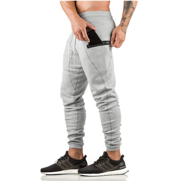 Sporta bikses ar sānu kabatu un šņorēm