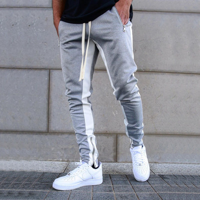 Muške sportske hlače sa šarenim motivima