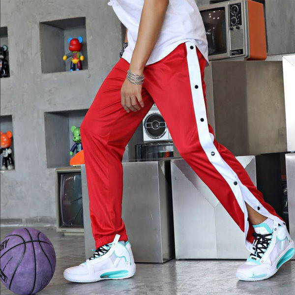 Vīriešu treniņbikses ar pogas aizdari sānos